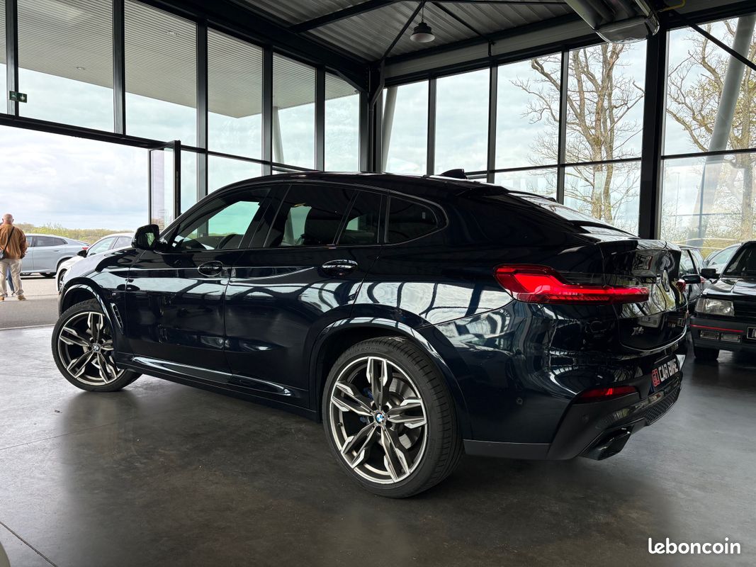 BMW X4 M40i 354CH Carbonschwarz Entretiens complets BMW Attelage Toit Ouvrant Harman Kardon Sièges électriques Caméra 360 21P Garantie 6 ans 559/mois (image 2)