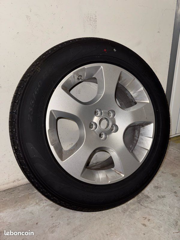 1 pneu neuf 235/60 R18 107H Pirelli + jante (image 1)