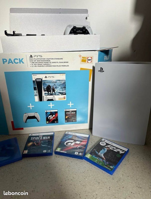 PlayStation 5 Standard - Pack complet avec 2 manettes + 4 jeux - Très bon état (image 1)