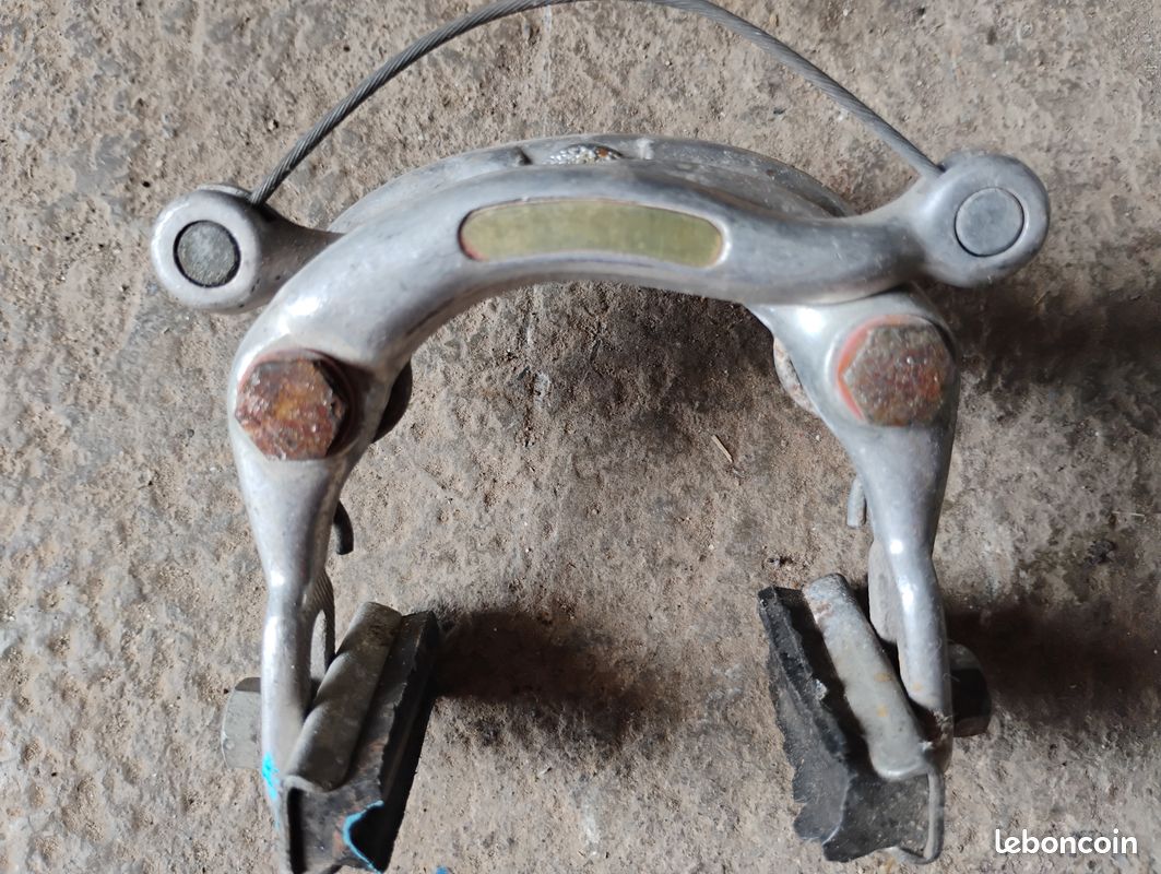 paire d'anciens etriers de frein en acier inox - pas de marque apparente