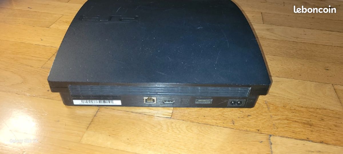 Ps3 slim + 1 manette + 1 manette offerte+lot de 7 jeux (image 2)