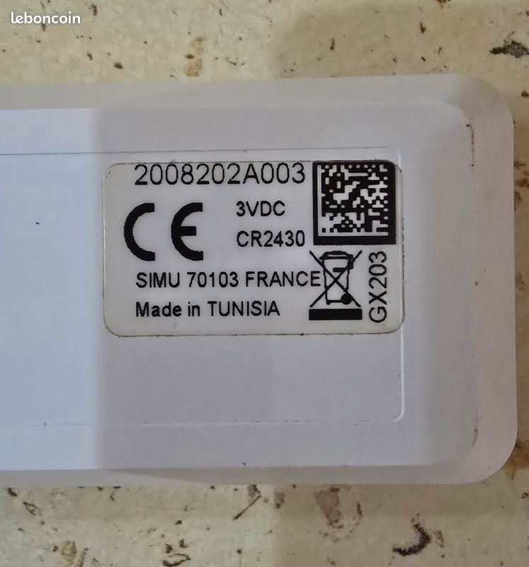 Télécommande SIMU pour volet roulant – 3V CR2430 – avec support mural (image 2)
