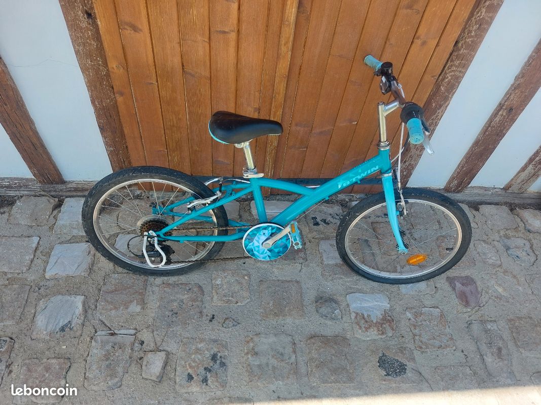 Vélo bleu BTwin original 120 (image 1)