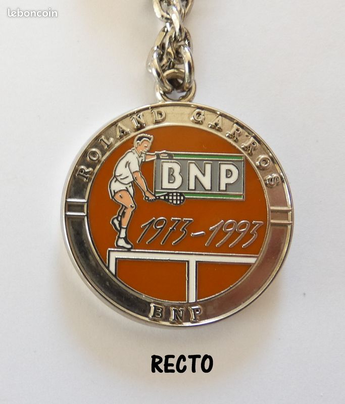 Pin's TENNIS BNP 1973-1993 ROLAND GARROS Pin ARTHUS BERTRAND rare 3,1cm