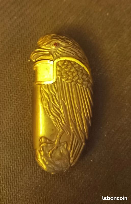 Briquet tempête Aigle vintage métal doré – fonctionne parfaitement (image 1)