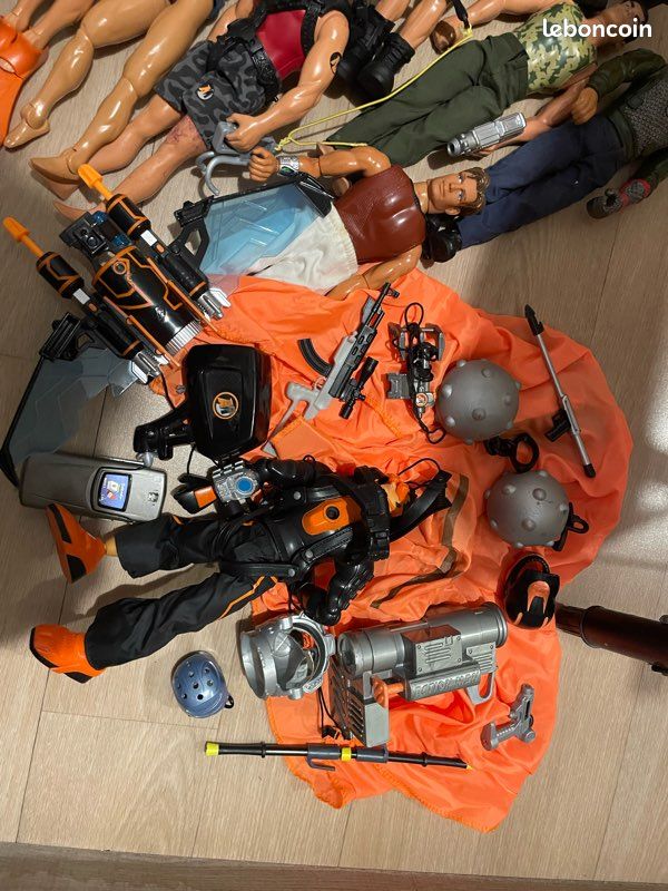 A large selection of assorted Action Man figurines and accessories in