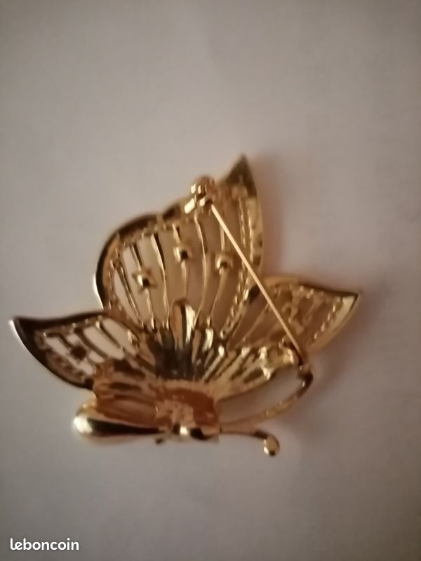 Broche vintage en métal doré (Gebraucht) in Marly für CHF 6 – mit