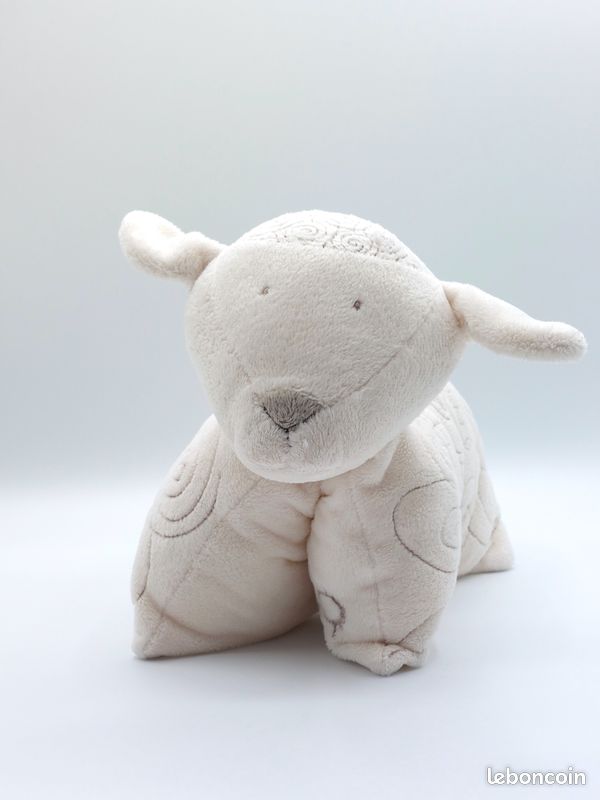Doudou peluche mouton écru blanc OBAIBI forme coussin spirales env