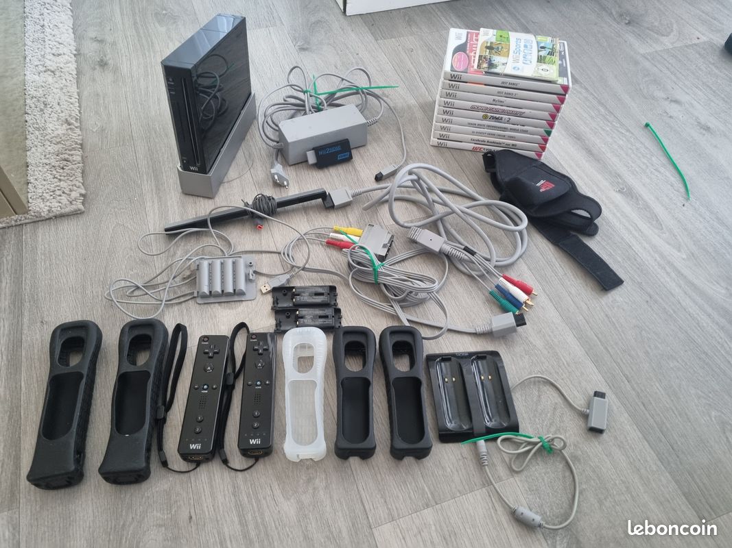 🎮Lot Nintendo Wii complète + 2 manettes + 10 jeux + accessoires (image 1)