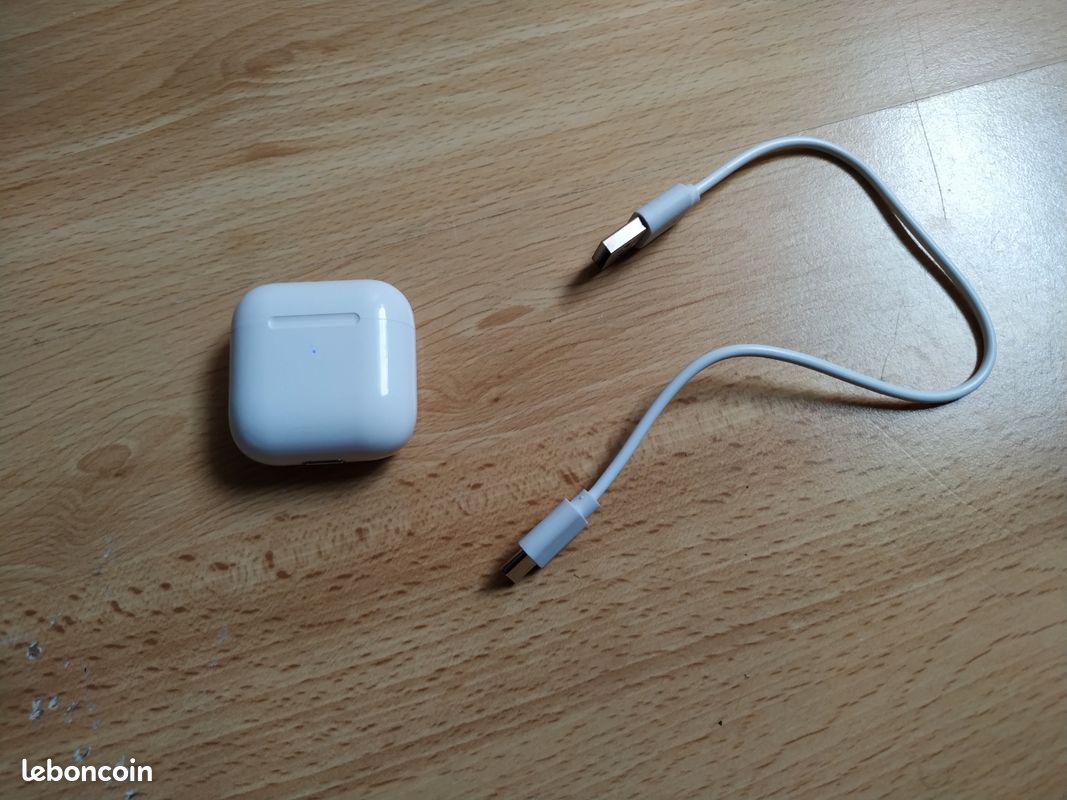 Écouteur sans fil vendu avec chargeur jamais utilisé (image 1)