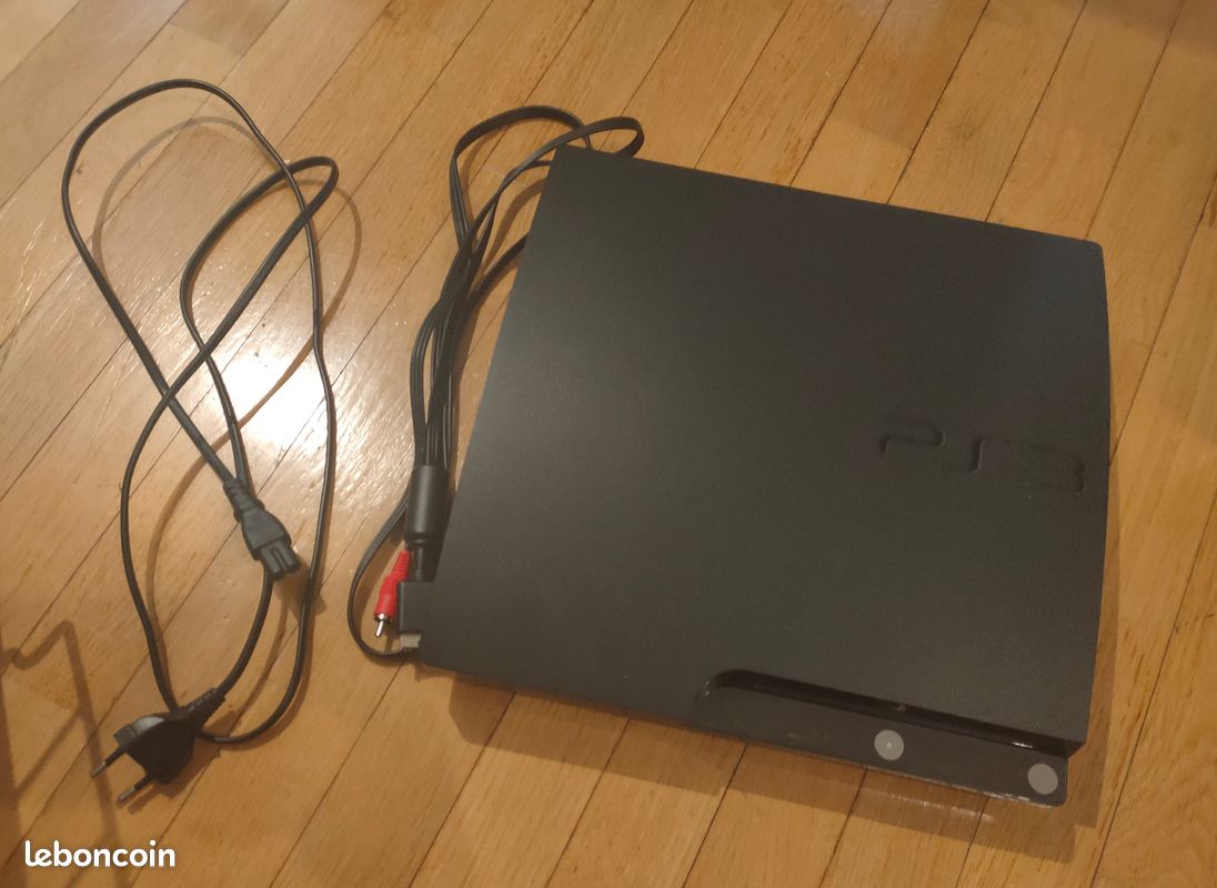 Playstation 3 slim avec 3 manettes et 13 jeux (image 2)