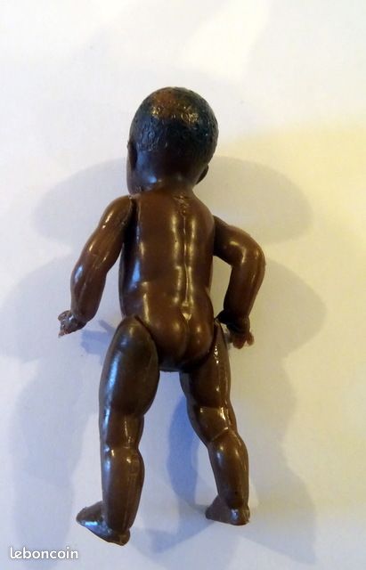 Baigneur Petit Colin tête d'aigle yeux mobiles