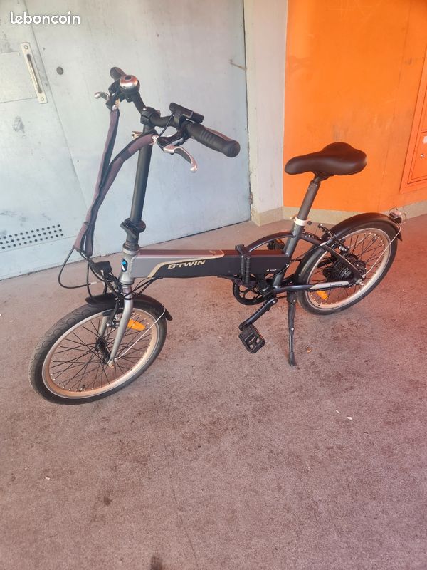 Vélo électrique pliant B'Twin avec facture (image 1)