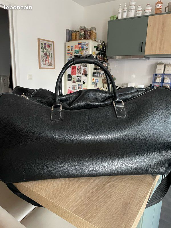 LANVIN - Sac de voyage en toile siglée et cuir bordeaux. Très bel état