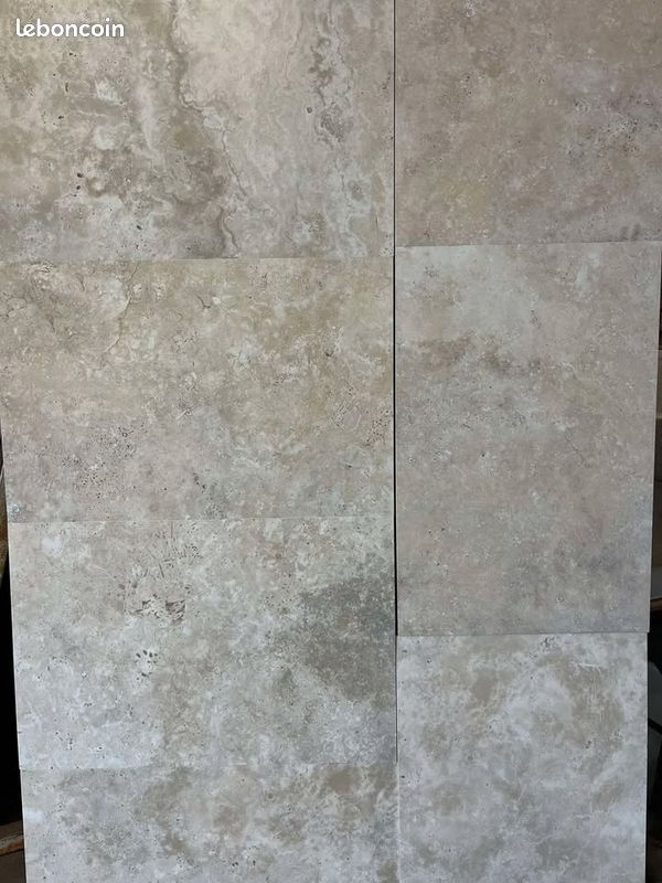 Carrelage haut de gamme beige effet travertin nuance (image 1)