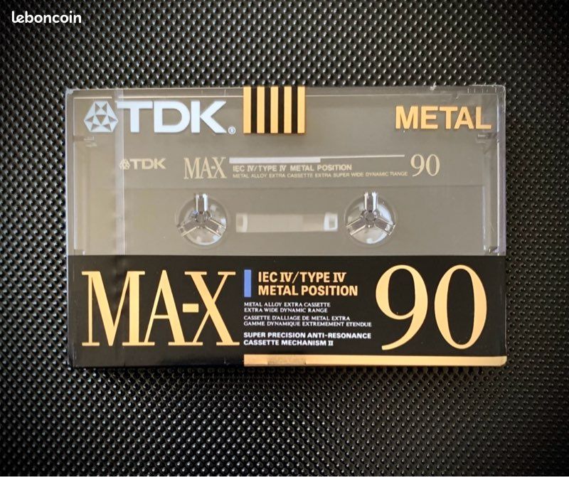 TDK MA-XG 90 oöppnat kassettband från