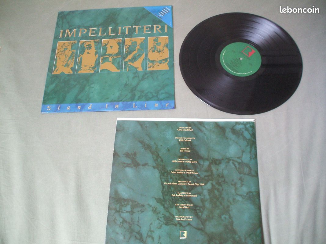 à saisir.......RARE ALBUM LP vinyle 33t de........" IMPELLITTERI "....STAND in LINE...HARD-ROCK/HEAVY/METAL....import US...1988...top état (image 5)