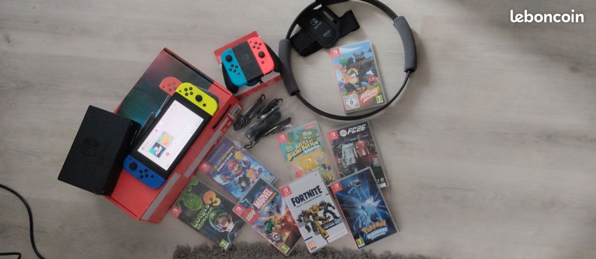 Switch complète + jeux + accessoires
Nintendo Switch complète + jeux + accessoires (image 1)