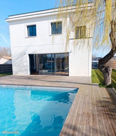 Maison récente 4 chambres 215 m²