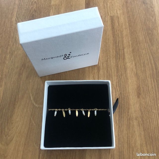 Bracelet marbré en acier inox doré avec boîte (image 1)