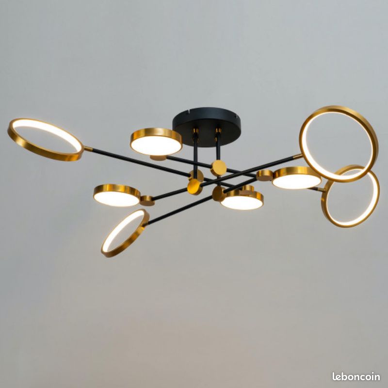Kosilum grand plafonnier led noir et doré bras entrecroisés - tolani (image 1)