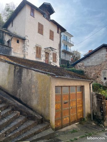Maison de ville avec garage et jardin
