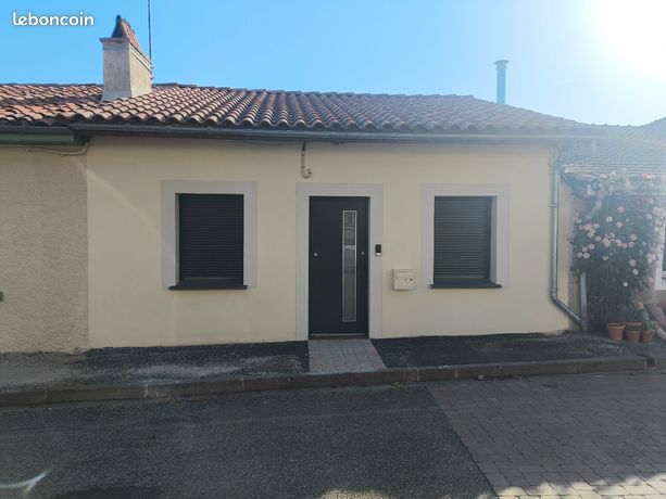 Maison de rue 85 m² – 2 chambres – Garage