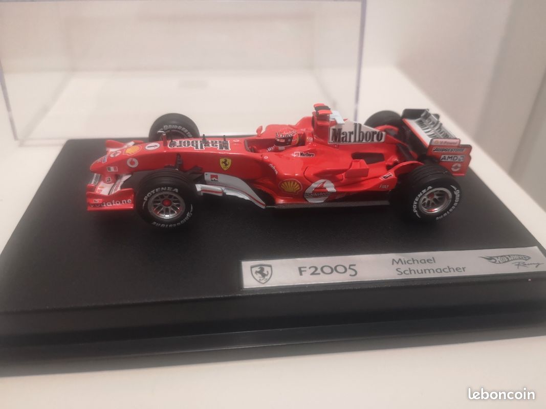 A collectible scale model Ferrari F2004 from Hot Wheels