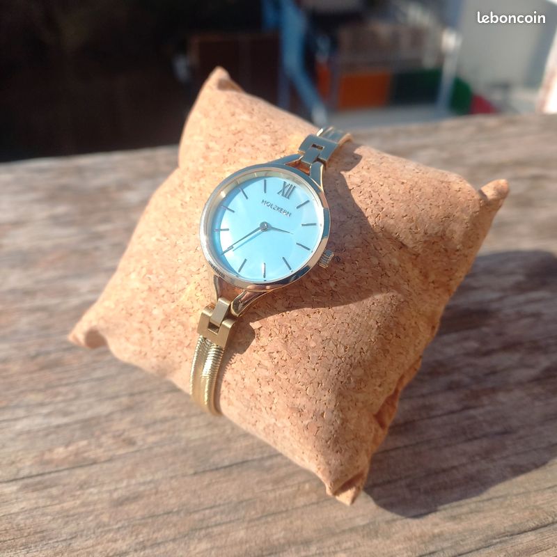 Petite montre neuve pour femme Holzkern en nacre bleue et or