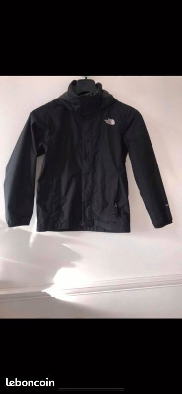 Manteau coupe-vent noir T10 ans THE NORTH FACE (image 1)