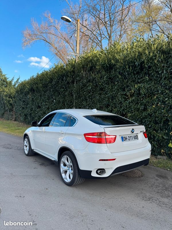 BMW X6 3.5DA XDRIVE 286 ch EXCLUSIVE
Année 07/2009- BLANC- 166500KLMS (image 2)