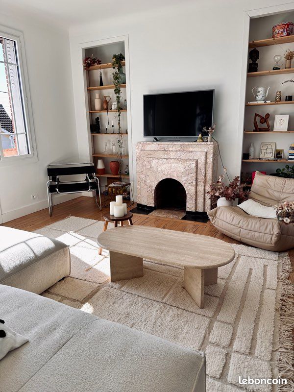 Table basse ovale en travertin (image 1)