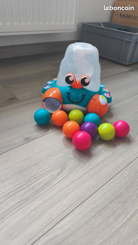 EnfantsJeux et jouetsActivités et jouets pour bébéPush & pull toysAuby Push & pull toys Auby jouet de bébé crabe fou lanceur de balles (image 1)