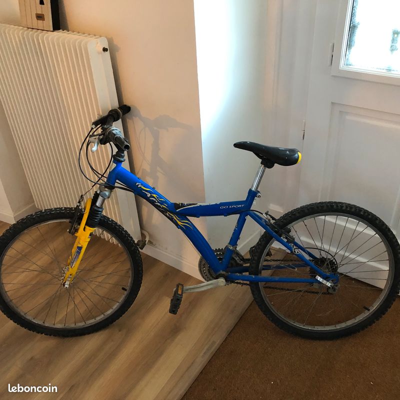 Vélo bleu et jaune (image 1)