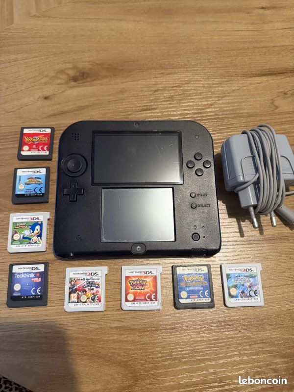 Nintendo 2DS avec chargeur et jeux (image 1)