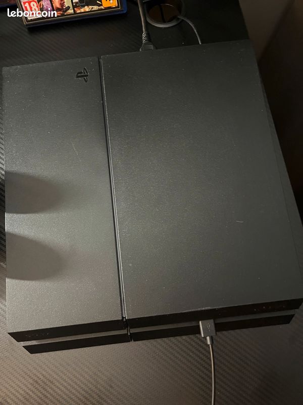 PS4 avec jeux et manettes (image 3)