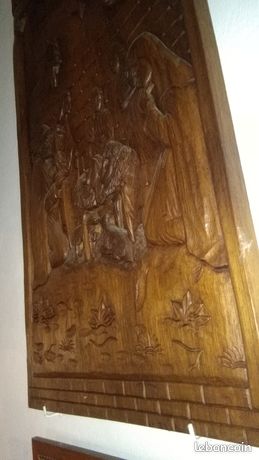 Tableau en bois sculpté en relief...