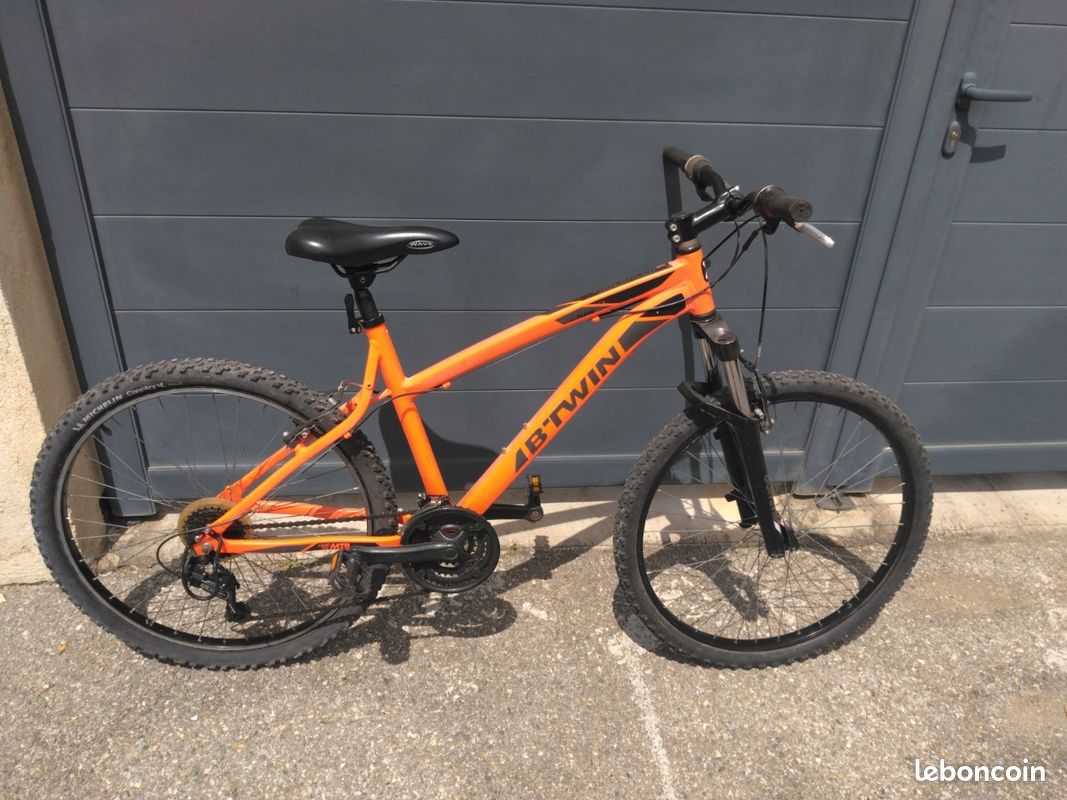 Orange Decathlon Velo Rockrider 340 Orange Velo Rockrider 26
