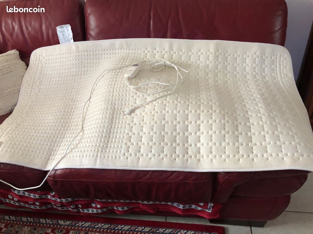 Sur matelas chauffant (image 1)