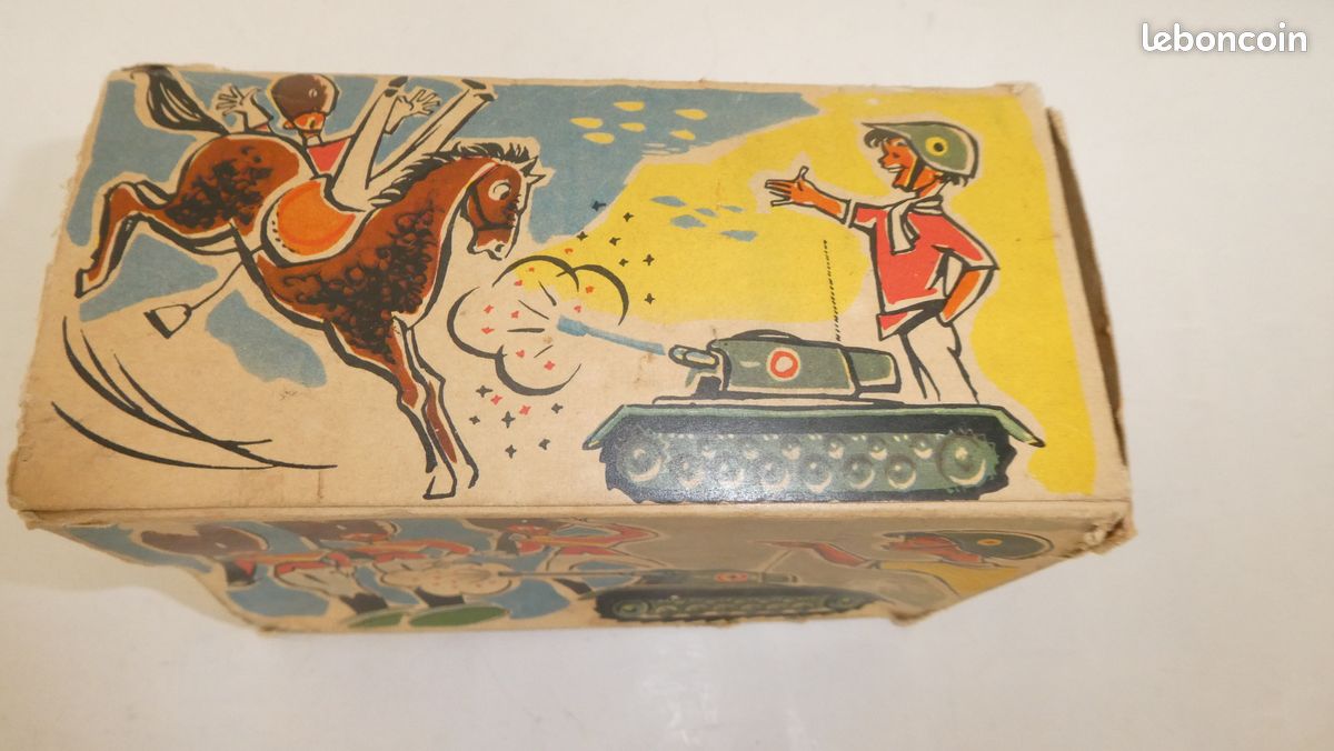 Ancien jouet mécanique en tôle / Collection déco