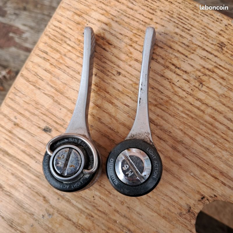 Ancien levier de vitesses Shimano flèche dorée tube