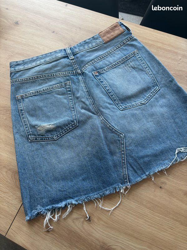 Mango - Jupe en jean mi-longue avec patte de boutonnage asymétrique