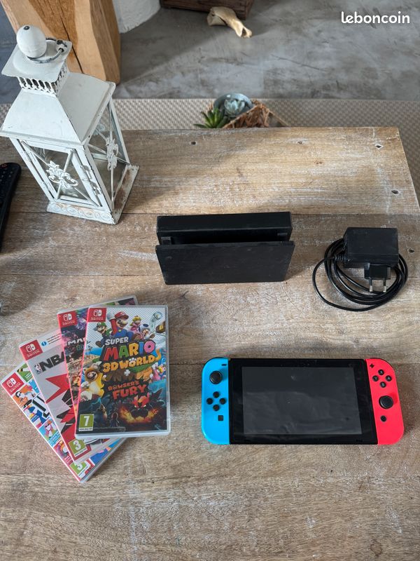 Nintendo Switch + Mario Kart 8 + Mario Bowser Fury (image 1)