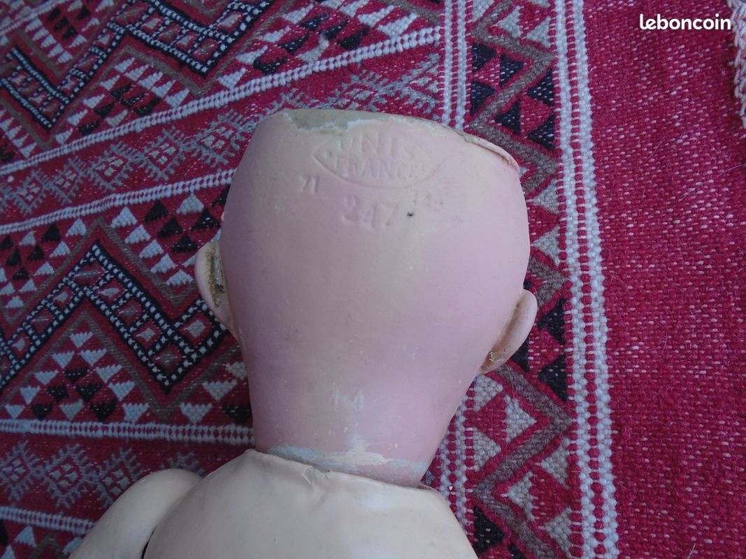 UNIS France : Poupée tête en carton bouilli,... - Lot 9 - Pousse-Cornet