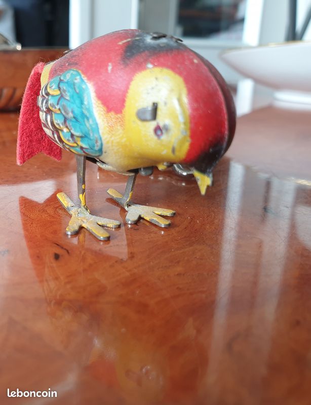Ancien oiseau mécanique en tôle (image 1)