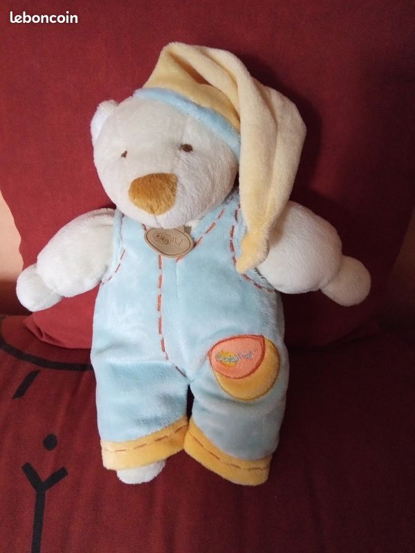 Doudou ours avec salopette bleu ciel bonnet jaune babynat (image 1)