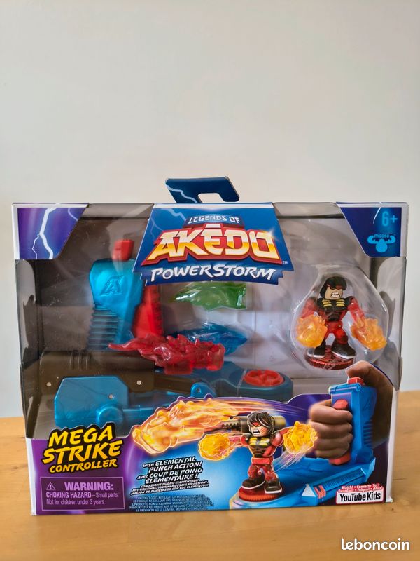 Akedo-Légendes Powerstorm Manette de méga Coup de Poing élémentaire et Figurine Exclusive Turbo