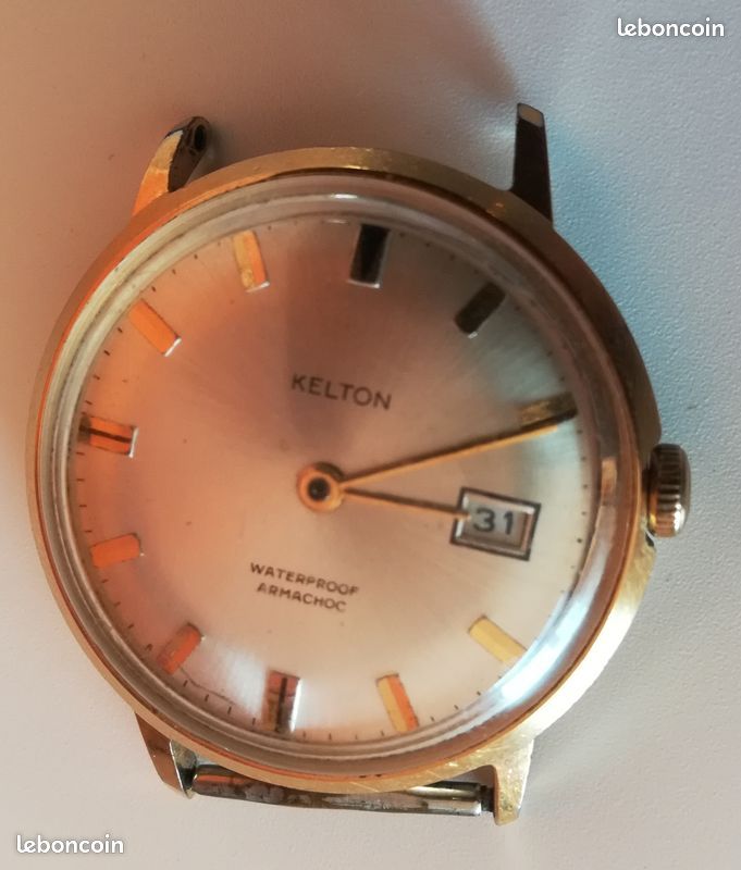 Montre Mécanique Kelton Armachoc Occasion - Mouvement Manuel - Boîtier Et Bracelet Acier Argenté - Cadran Gris Chiffres Arabes