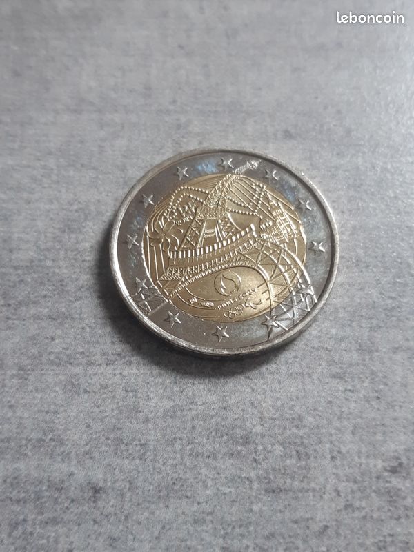 2 EUROS J.O DE PARIS 2024 TOUR EIFFEL Etat sup prix: 7 2 EUROS COMMEMORATIVE 50 ANS DU TRAITE DE L' ELYSEE VERTRAG VERSION FRANCE 2013 Etat sup (image 1)