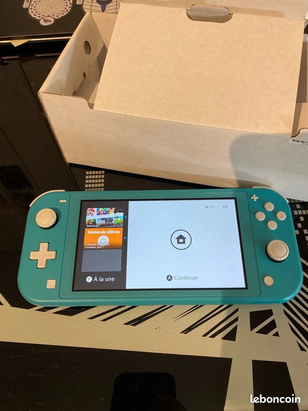 Nintendo Switch Lite + chargeur (image 1)